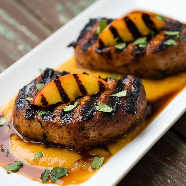 Smoky Grilled Pork Chops with Curried Ginger Nectarine Sauce Recipe for Smoky Grilled Pork Chops with Curried Ginger Nectarine Sauce
